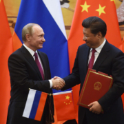 BEIJING, CHINA - JUNE 25: Russian President Vladimir Putin (L) shakes hands with Chinese President Xi Jinping during a signing ceremony in Beijing's Great Hall of the People on June 25, 2016 in Beijing, China. Russian President Vladimir Putin is in China to discuss more economic and military cooperation between the two countries. (Photo by Greg Baker-Pool/Getty Images)