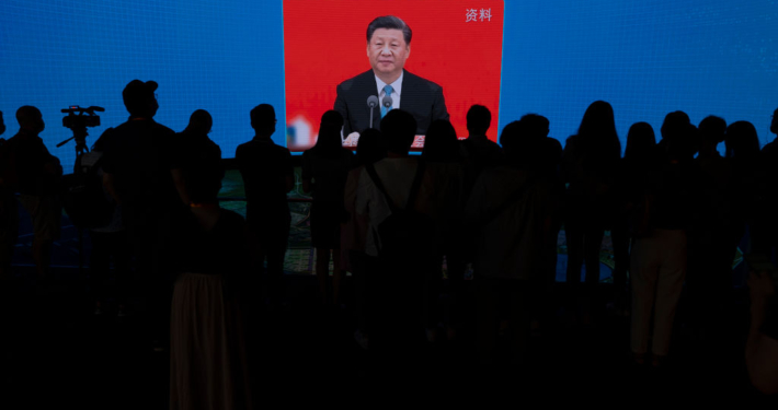 SHANGHAI, CHINA - JUNE 17: Chinese President Xi Jinping is seen on the screen during a presentation of Lingang Special Area of China, Pilot Free Trade Zone to the press during a state organized media trip on June 17, 2021 in Lingang, Shanghai, China. (Photo by Andrea Verdelli/Getty Images)