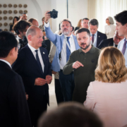 Image shows Ukraine President Volodymyr Zelensky speaking with G7 leaders in Italy this week. Photo by Steffen Kugler/Bundesregierung via Getty Images.