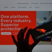 The CrowdStrike logo is being displayed on a smartphone with the CrowdStrike web page visible in the background in this photo illustration in Brussels, Belgium, on July 19, 2024. (Photo Illustration by Jonathan Raa/NurPhoto via Getty Images)