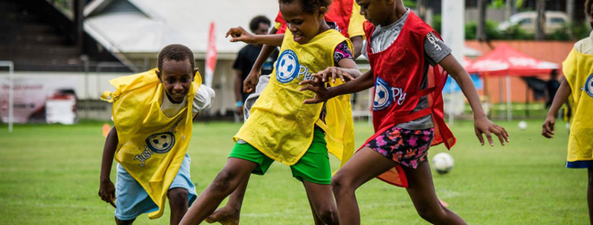 Children playing in the Just Play program in Vanuatu: Oceania Football Confederation via the Australian Department of Foreign Affairs and Trade