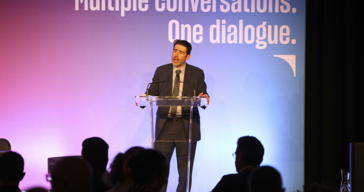 Justin Bassi speaking at The Sydney Dialogue in 2024.