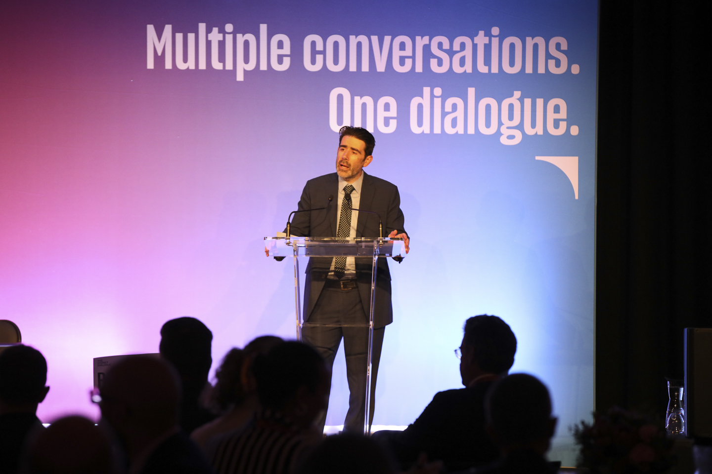 Justin Bassi speaking at The Sydney Dialogue in 2024.