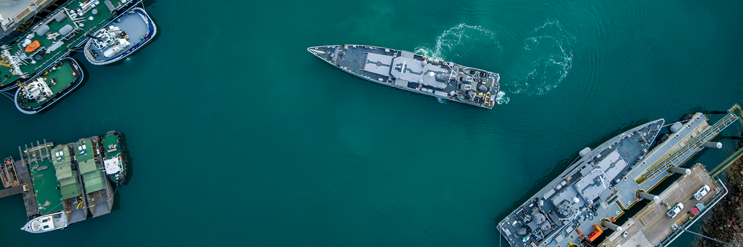 HMAS Cape Pillar manoeuvres within HMAS Coonawarra basin, Darwin, Northern Territory.